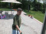Me washing the patio