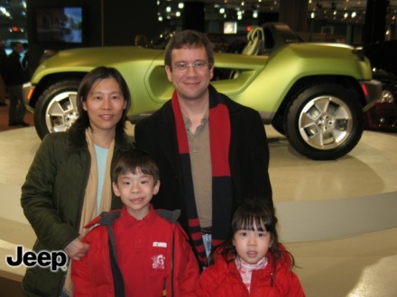 Picture of the family in front of the concept Jeep